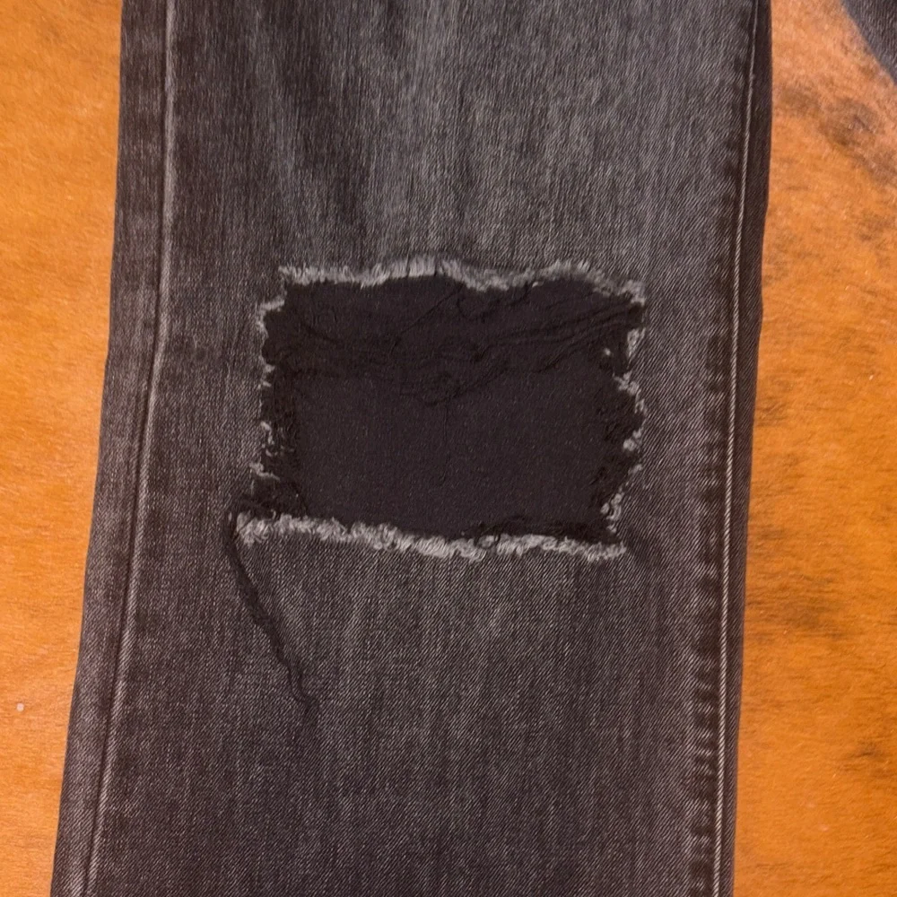 Vibrant Black High Rise Distressed Jeans size 25